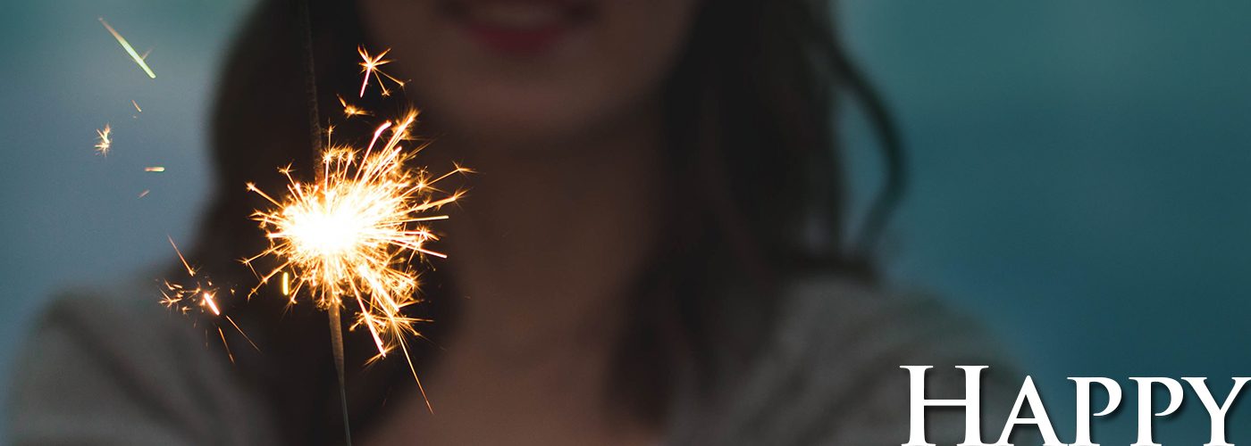 Happy Sparkler held by woman